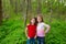 Children friend girls playing on the jungle park forest