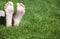 Children girl foot grass background