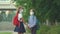 Children go back to school. Cute pupils with backpacks. Boy and girl in safety masks