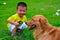 Children and Golden retriever dog