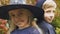 Children in Halloween costumes posing for camera, preparation for scary party