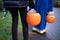 Children with Halloween pumpkin baskets
