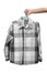 Children hand holding checkered boy shirt on white background