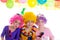 Children happy birthday party with clown wigs