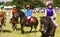 Children heading towards the starting line on their shetland ponies for Grand National qualifier