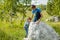 Children help each other to climb the rock