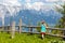 Children hiking in Alps mountains. Kids outdoor.