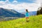 Children hiking in Alps mountains. Kids outdoor.