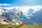 Children hiking in Alps mountains. Kids outdoor