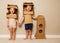 Children hold hands with cardboard astronaut helmets and rocket