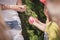 Children hold a round rubber ball filled with flour