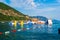 Children on Inflatable entertainment water attractions and slides on sea.  Budva Riviera. Jaz Beach, Montenegro