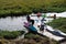 Children from a kayaking club finishing their Sunday workout