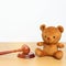 Children, Kid and Family Law concepts. toy bear with gavel justice hammer on desk in courthouse