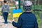 Children or kids with luggage, suitcase or bag, winter clothes, hat and Ukrainian flag