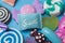 Children or kids sweet candy background. Toys top view