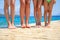 Children legs on the wooden pier