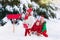 Children with letter to Santa at Christmas mail box in snow