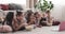 Children lying on floor watching movie and eating popcorn