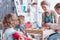 Children making plasticine figurines