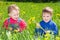 Children on meadow dandelion .