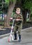 Children with military uniform put on. Celebration of the Victory Day in the Moscow park. State holidays of Russia.