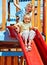 Children move out to slide in playground