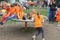 Children in orange clothes are playing at the playground at Kingsday (Koningsdag), Utrecht, Netherlands
