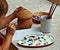 Children painting pottery 1