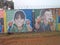 Children, painting on school wall