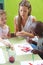 Children painting with tempera