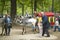 Children and parents at Donkey Ride in park, Paris, France