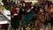 Children and parents wait in line at Coquitlam Center Mall to visit and have their picture taken with Santa Claus.