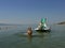 Children on pedal boat at sea 5