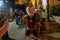 Children are photographed with Santa Claus in the evening at the German Colony in Haifa, northern Israel