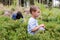 Children picking blueberries