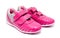 Children pink sport shoes isolated