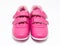 Children pink sport shoes isolated