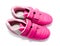 Children pink sport shoes isolated