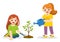 Children planted young trees and watering flowers from watering can.