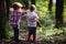 Children play in autumn forest. Children friends camping in woods