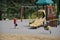 Children play on a closed Toronto public playground during the Covid-19 Pandemic.