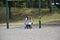 Children play on a closed Toronto public playground during the Covid-19 Pandemic.