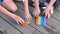 Children play with colorful antistress sensory toy fidget push pop it