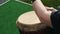 Children play on the Indian drum