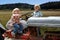 Children Play on old farm tractor open field