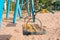 Children play on the playground swings