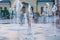 Children play and splash in the city`s fountains in the square. Editorial. 08.03.2017