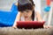 Children play Tablet on Living room carpet