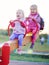 Children play teeter-totter outdoor